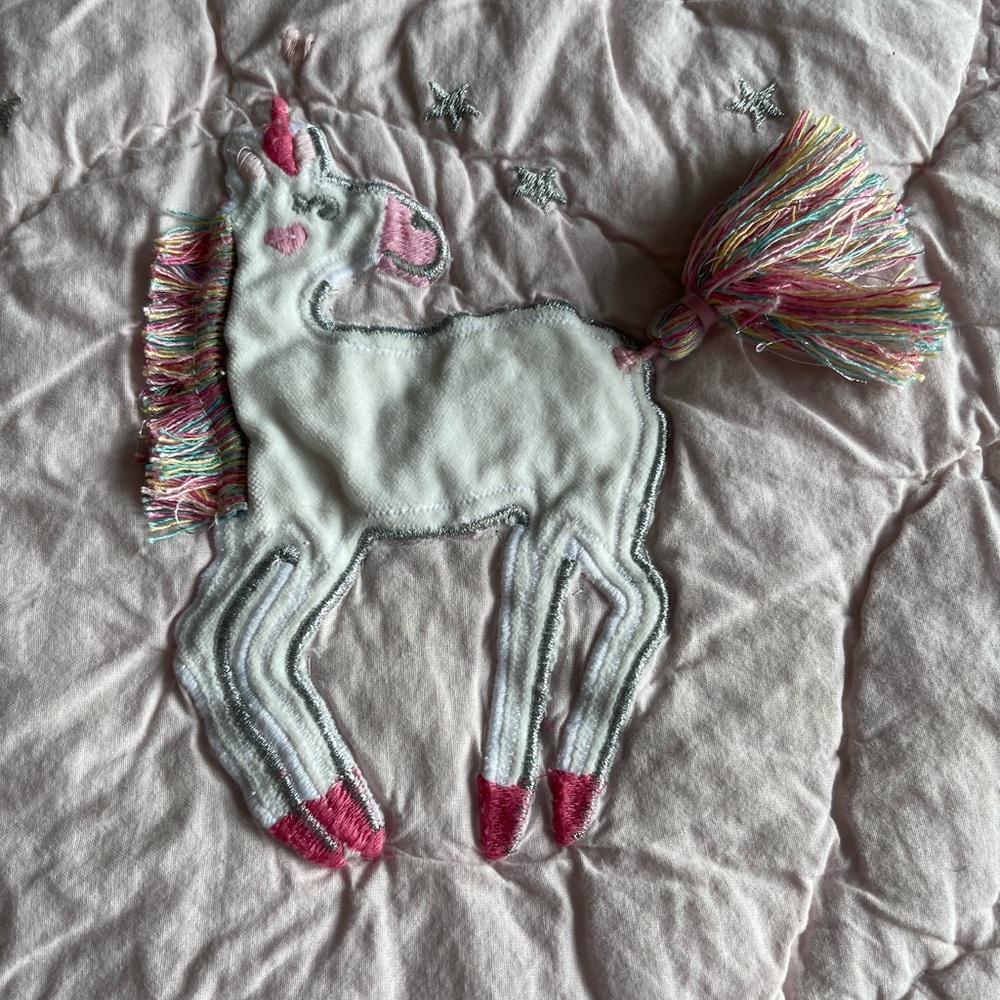 Full size Pottery Barn Kids quilt with unicorns.